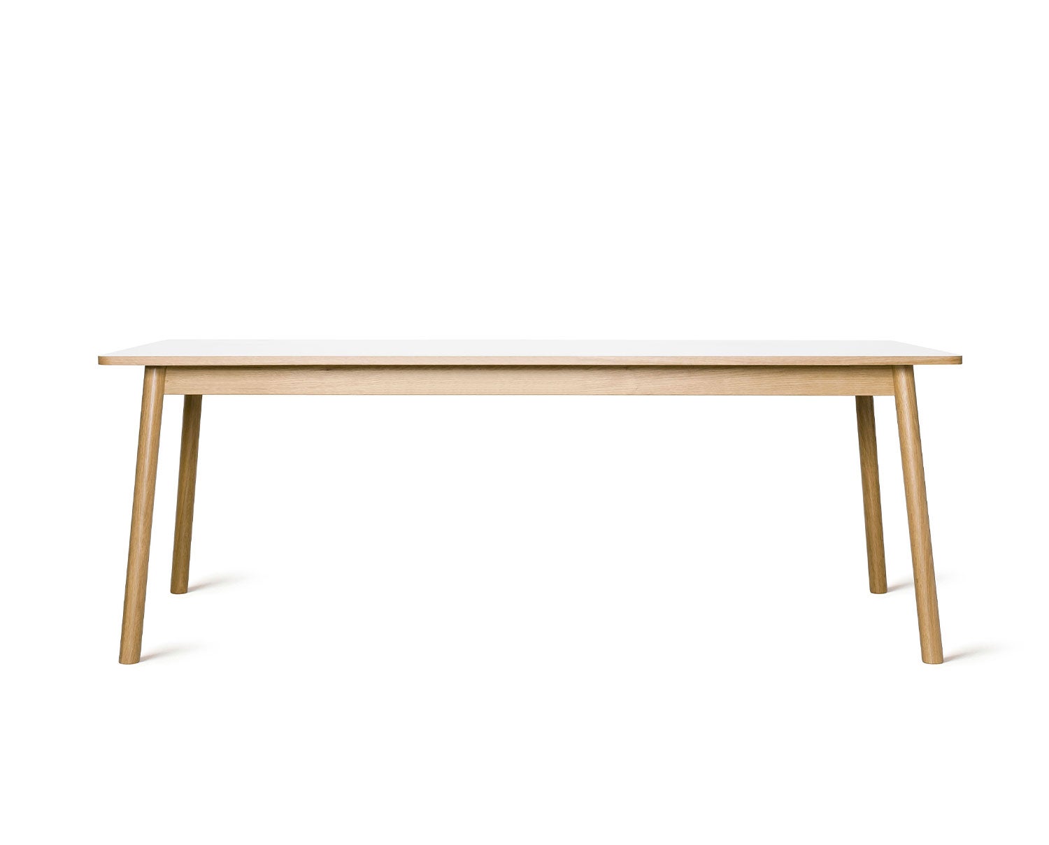Dino bord 200 cm. Bordsyta i vit HPL med kant i ek, sarg och ben i mattlackad massiv ek