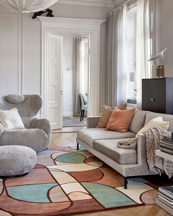 Modern Abstract Matta i färgen Multi Pastell under soffgrupp i vardagsrum