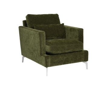 Maxx Fåtölj från Bröderna Anderssons klädd i ett grönt sammetstyg