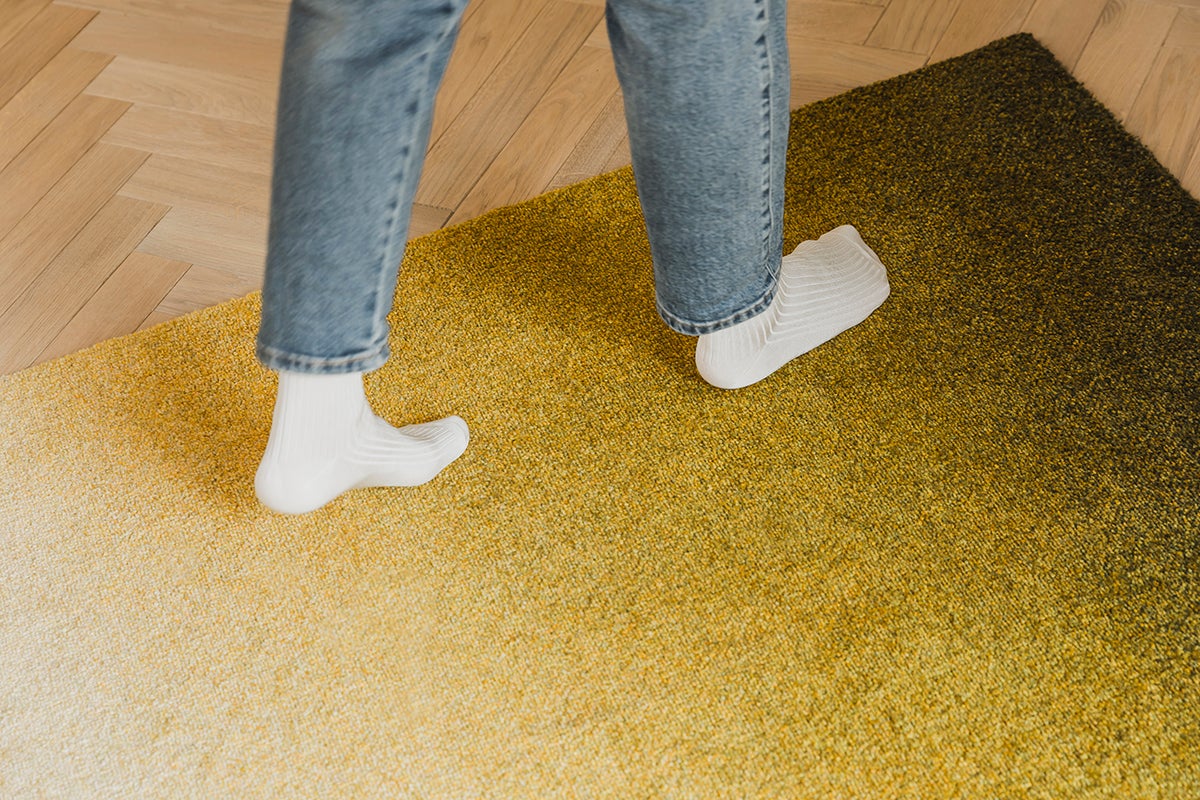 Dis dörrmatta i färgen moss.