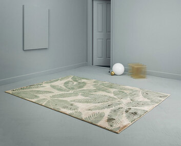 Ambrosia Matta på golvet i ett turkost rum